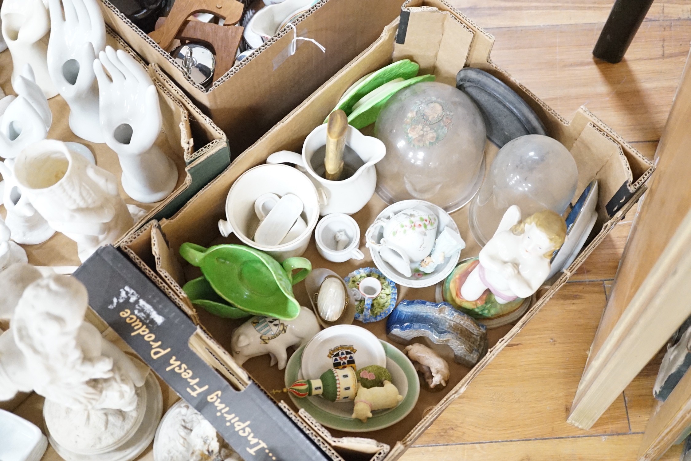 A large collection of mostly 19th century white glazed ceramics, including ring trees, model hands, figurines, vases and other coloured ceramics (five boxes)